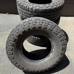 Four 315/70/17 Cooper Discover AT3