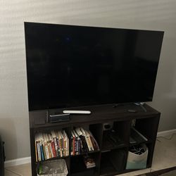 65in 4k Smart TV Like New! With nice TV Stand 