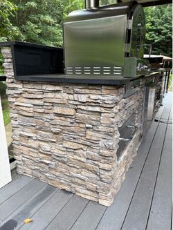 3 open boxes of faux sone- Stacked Stone Nantucket