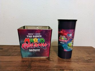 The Super Mario Galaxy movie popcorn tin and cup.