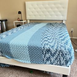 Full-size bed with mattress