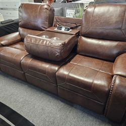 Brand New Brown Synthetic Leather Manual Reclining Sofa With Cup Holders And Charging Ports (87 x 40 x 42 in. H)