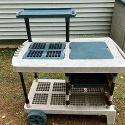 Older Rubbermaid Planting Station Solid Has Baskets And Shelves On Wheels 