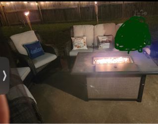 Outdoor patio furniture NO cushions, NO pillows. 3 seater sofa, 2 chairs, 1 ottoman. Fireplace table.