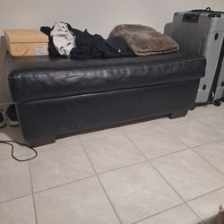 Leather blanket ottoman