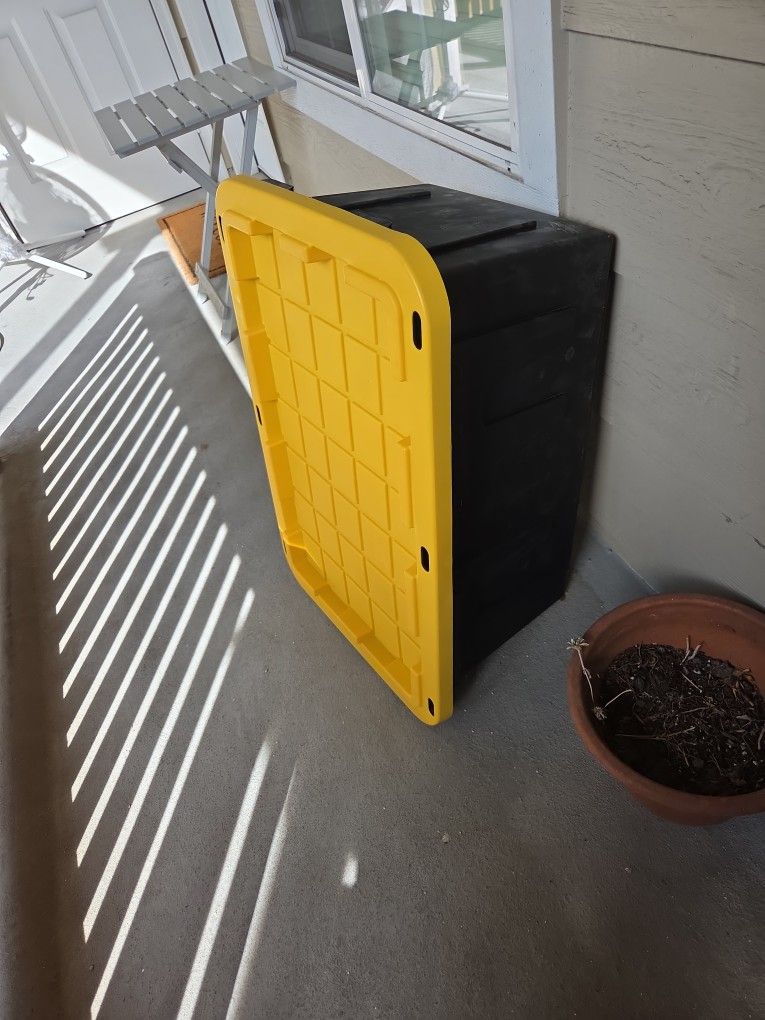 TWO HEAVY DUTY YELLOW AND BLACK TOTES