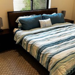 Eastern king bed with two nightstands.