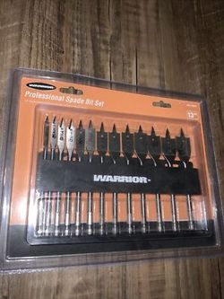 Warrior Professional Spade Bit Set, which is a 13-piece set of steel spade drill bits. 