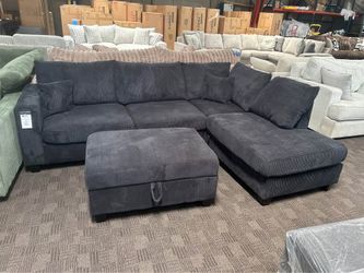 Black sectional w/ storage ottoman 