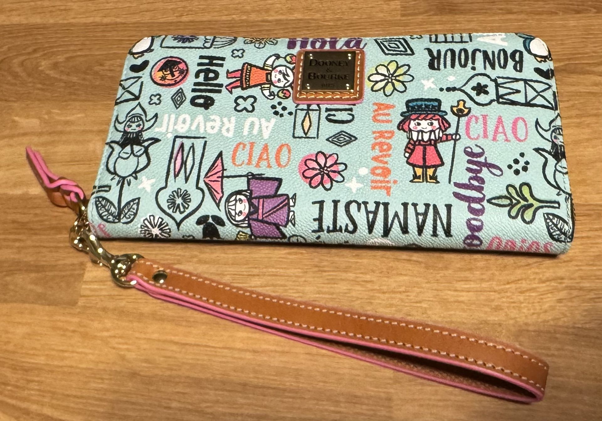 Dooney and Burke It’s A Small World Wallet.