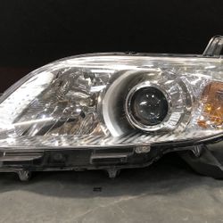 2011 Toyota Sienna LH Driving Side Headlight OEM Used