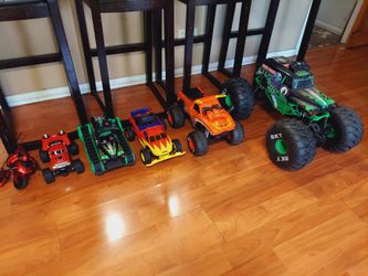 Huge lot RC Monster Trucks with Extras