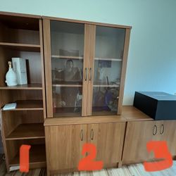 Set of 3 shelves cabinet with glass door in excellent condition.  1) 5 shelf - 19.5"W x 12.5"D x 72"H -- $50 2) Cabinet with 2 doors and a glass displ