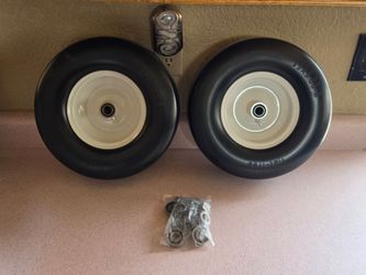 Flat free lawnmower tires and wheels