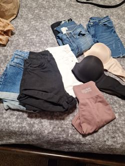 Size 4 black and blue shorts  size 3 jeans and shorts size 2 white shorts black leggings sm.  Medium pink Victoria seamless.   2 bras 38C strapless br