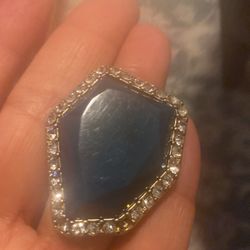 Ring with lucky stone with your blue and green stripes with crystal lobes