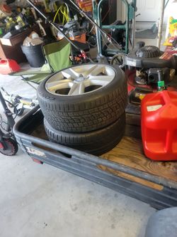 Four original 17-in Mercedes tires with rims