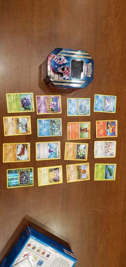 Pokémon cards and tin