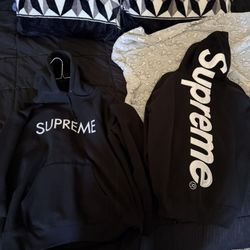 Two Supreme Sweaters