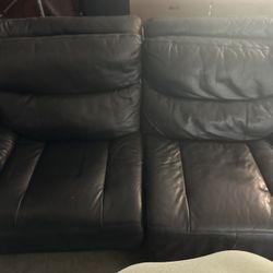 Couch. Black, Reclining. Used 
