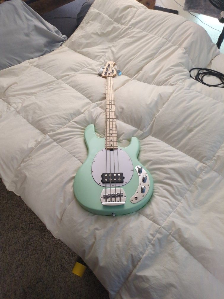 Sterling by Music Man StingRay RAY4 Maple Fingerboard Electric Bass Guitar Mint Green White Pickguard