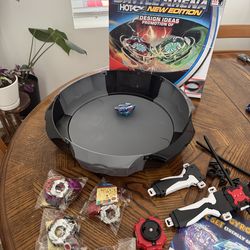 Battle arena toy with spinners