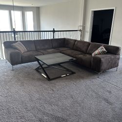 Large L shape Couch + Table + Cushions