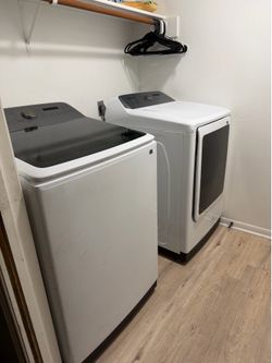 Samsung 5.5 cu. Ft high efficiency smart top load washer with electric dryer