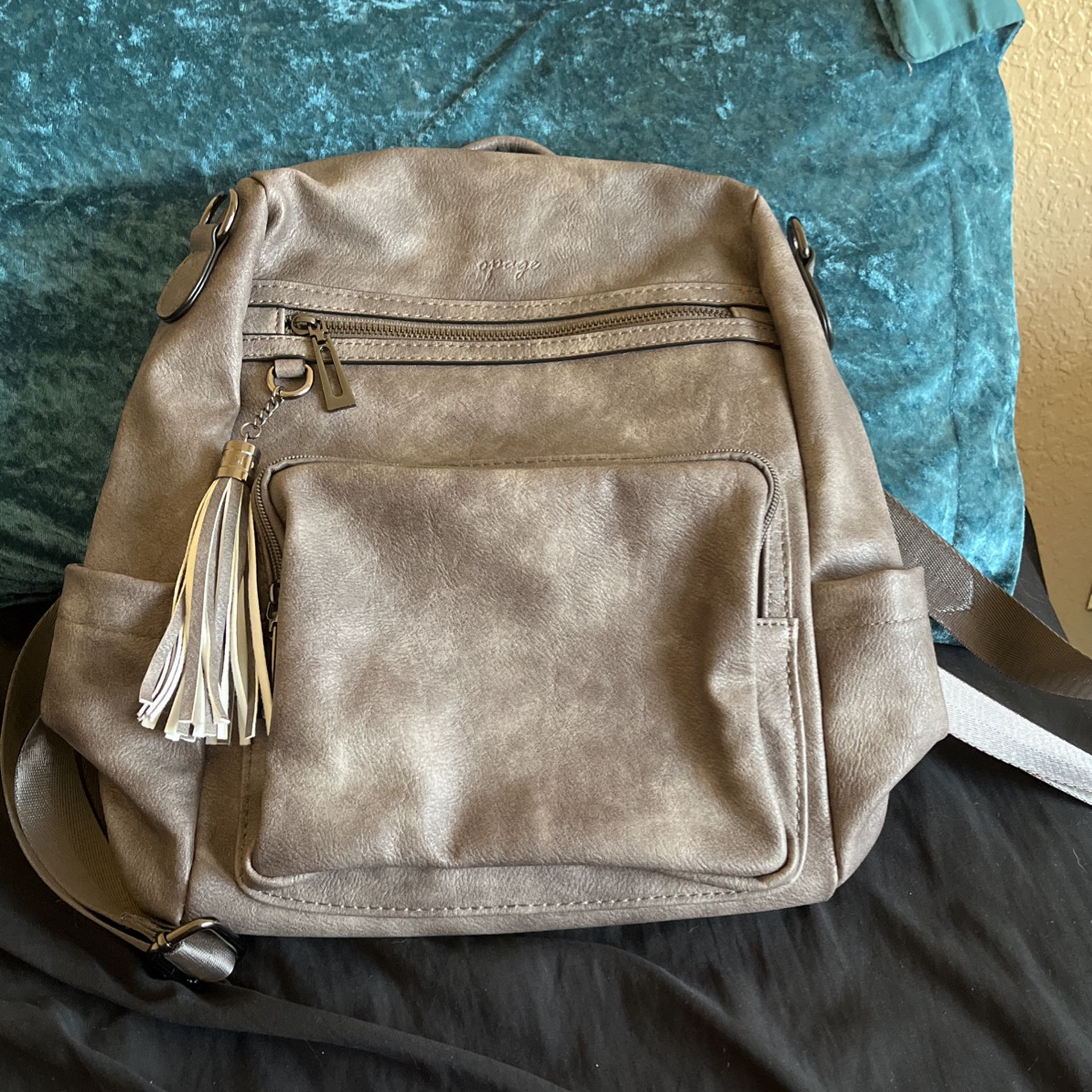 Grey Backpack With Extra Strap