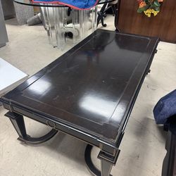 Louis XVI style Coffee Table featuring a high-gloss black finish and gilded accents - 59” x 29” x 18”