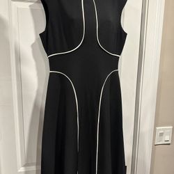 Chic Black A-Line Dress with White Piping Detail