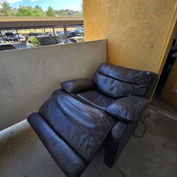 Leather rocker power recliner