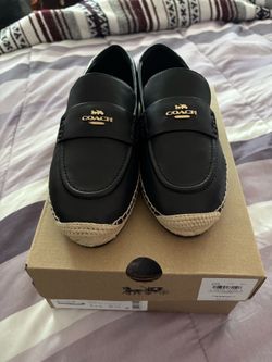 Brand new Coach Black Loafers with Gold Accents