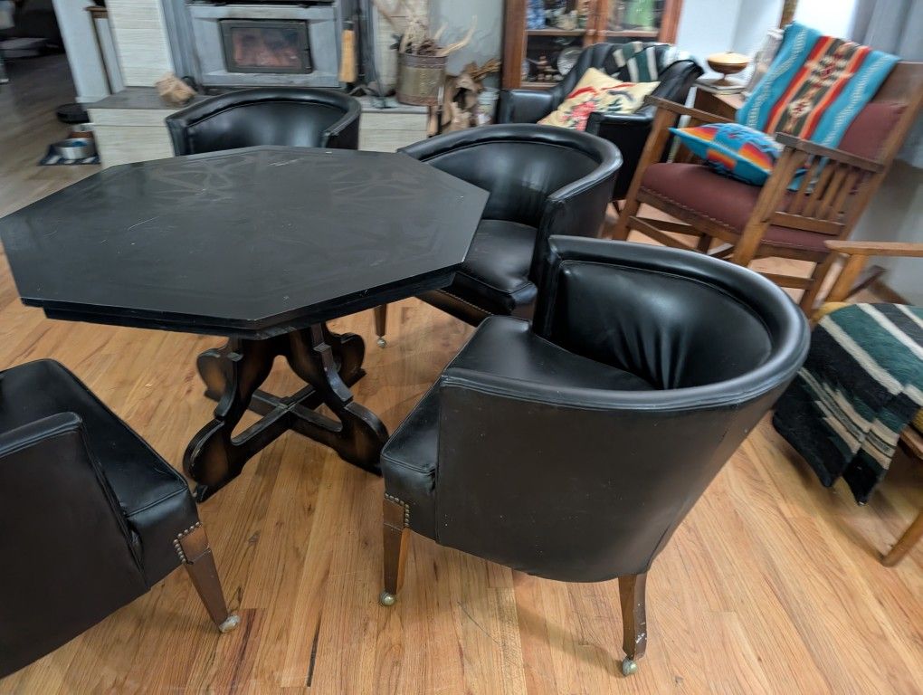 1967 Four Leather Chairs And Cast Obsidian And QuatzTable