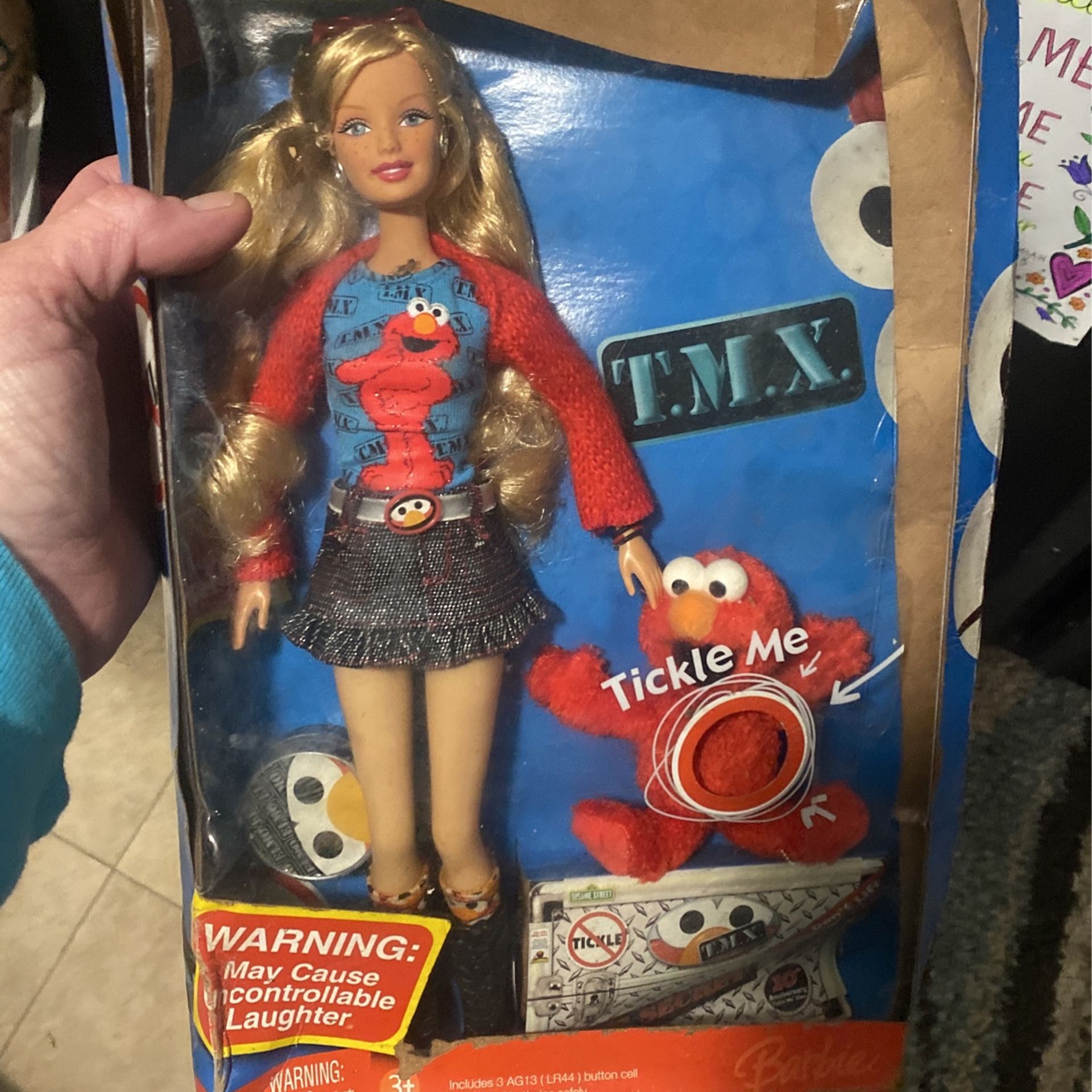 Tickle Me Elmo Barbie