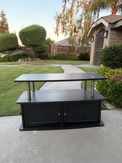 36 inch long x 22 inch high x27 inch wide cabinet with doors