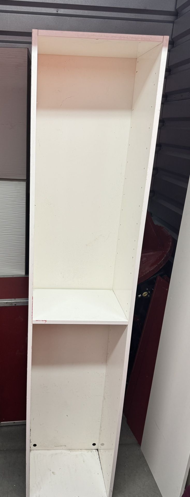 A piece of furniture for clothes or whatever you like with a door, just as seen in the photo.