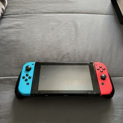 Nintendo Switch (Neon Red/Blue Joy-Cons) and Super Smash Bros. Ultima