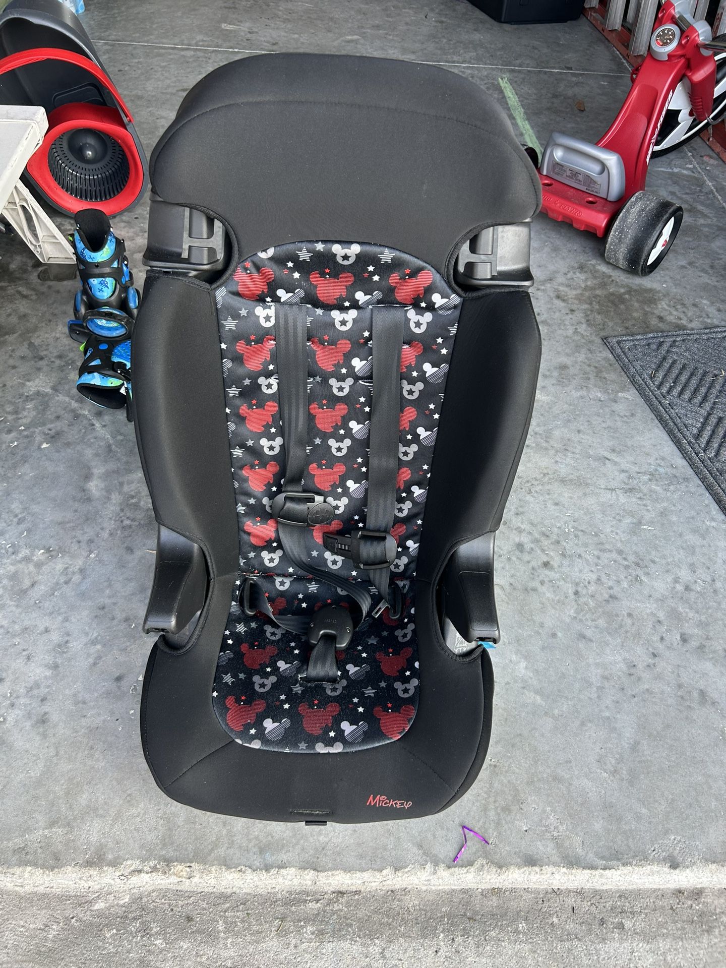 Kids Finale 2-in-1 Booster Car Seat with a Mickey Mouse design.