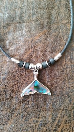 Pendant on leather necklace