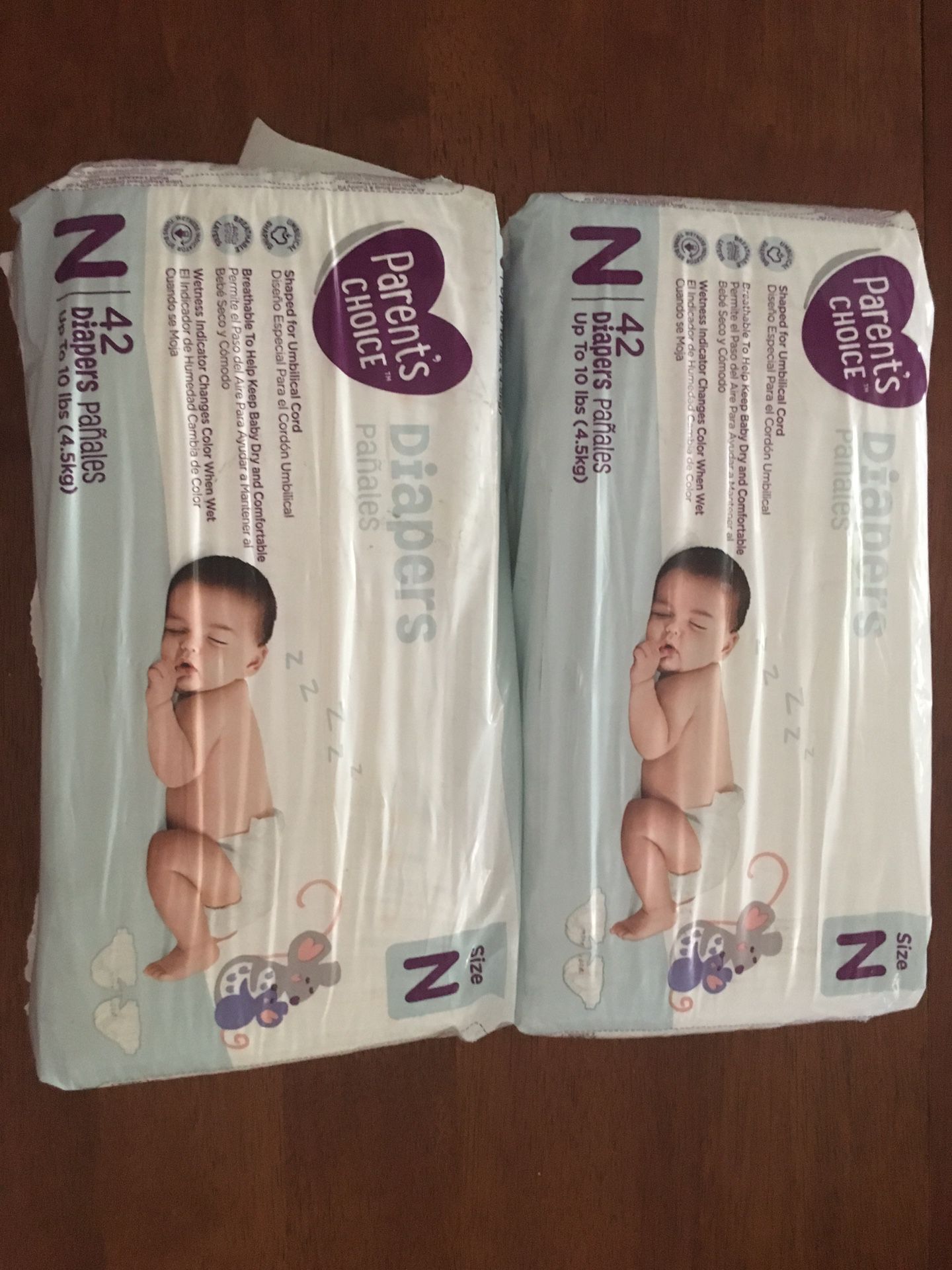 2 packs of newborn diapers