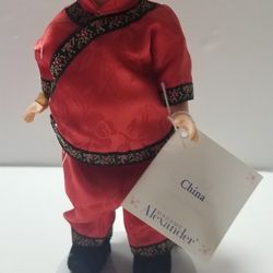 Collectable .Vintage MADAME ALEXANDER DOLL  8" China  Good condition. 