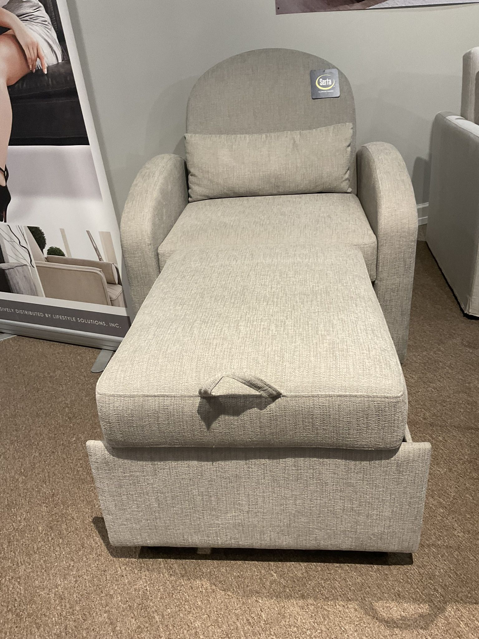 New accent chair with extendable ottoman by Serta