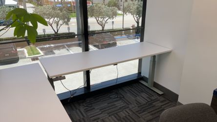 White Top Height- Adjustable desk with gray frame $150 each