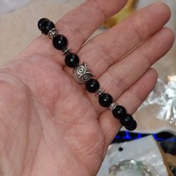 Black Beaded Stretch Bracelet  With A Silver Colored Owl For A Charm
