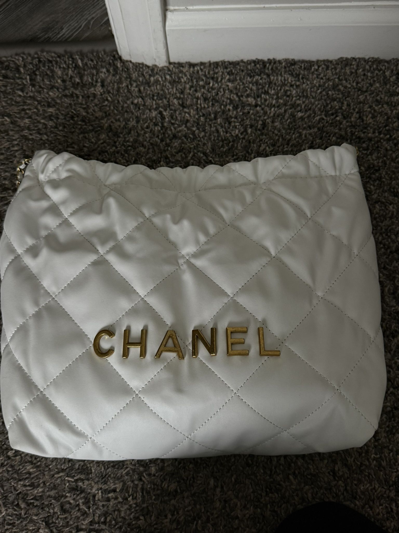 white and gold bag