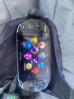 OG PS Vita w/charger & 4GB memory card