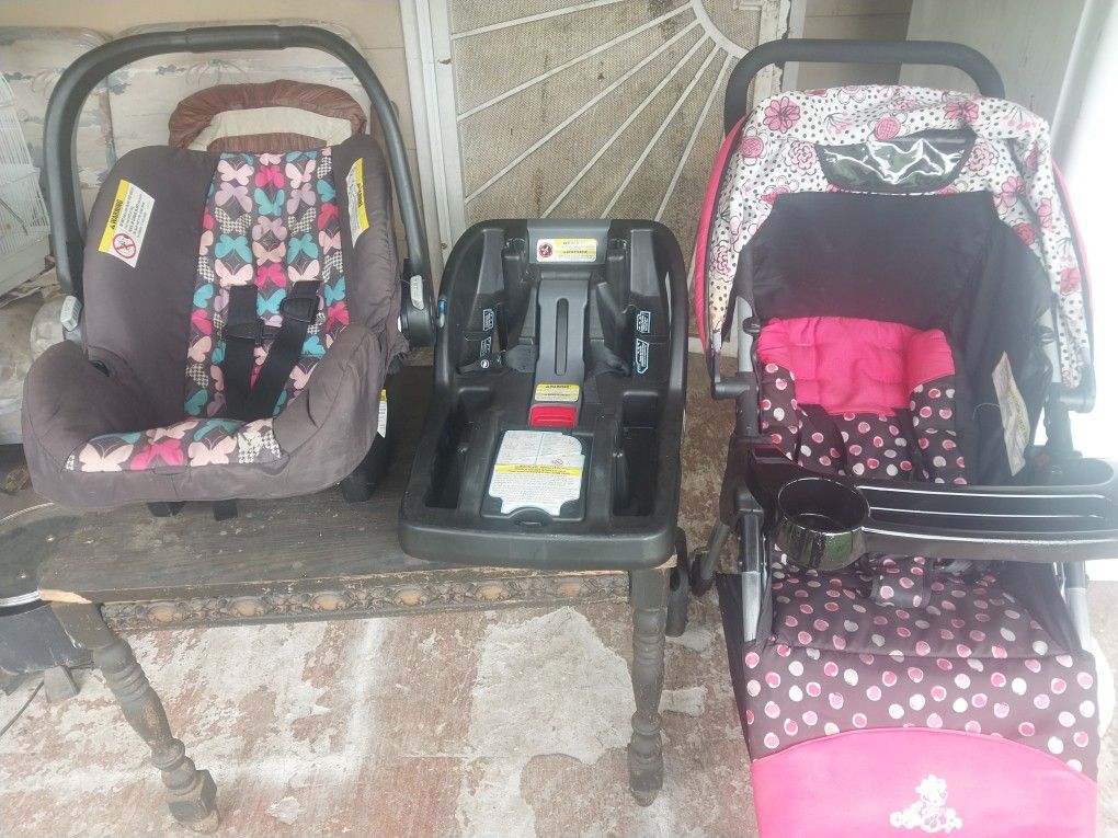 Child Carriage And 2 Car Restraining Seats In Perfect Working Conditions