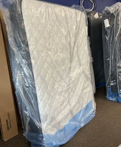 White Quilted Mattress Still in Plastic