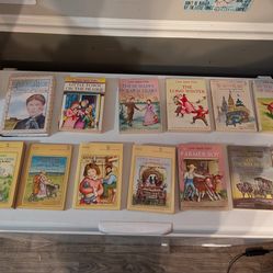 collection of books from The Little House series by Laura Ingalls Wilder